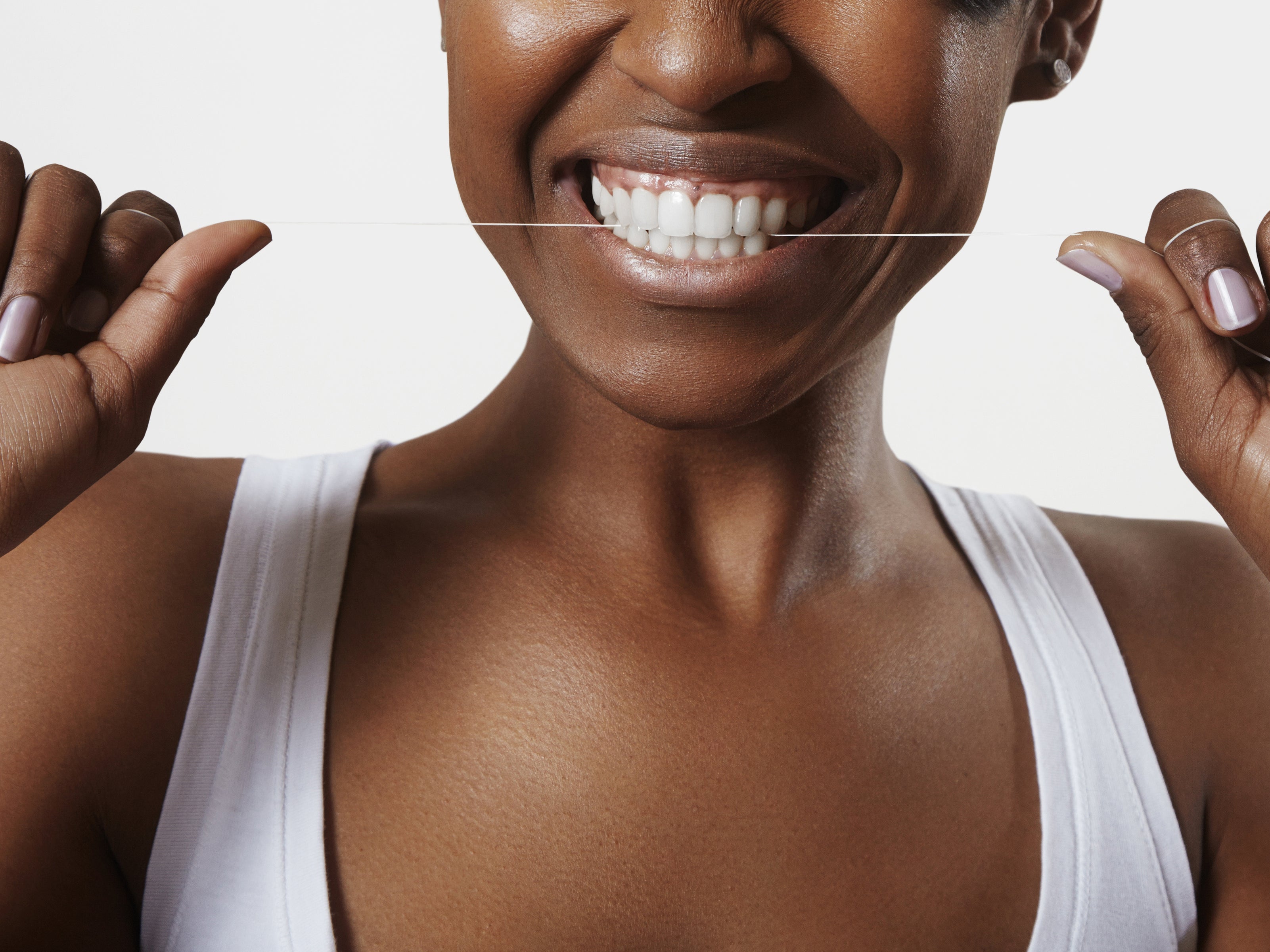 Floss Before or After Brushing Your Teeth