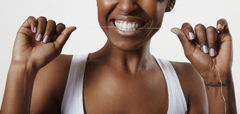 Floss Before or After Brushing Your Teeth