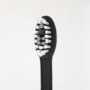 Close up of the Ordo Charcoal Grey Sonic+ Brush Head